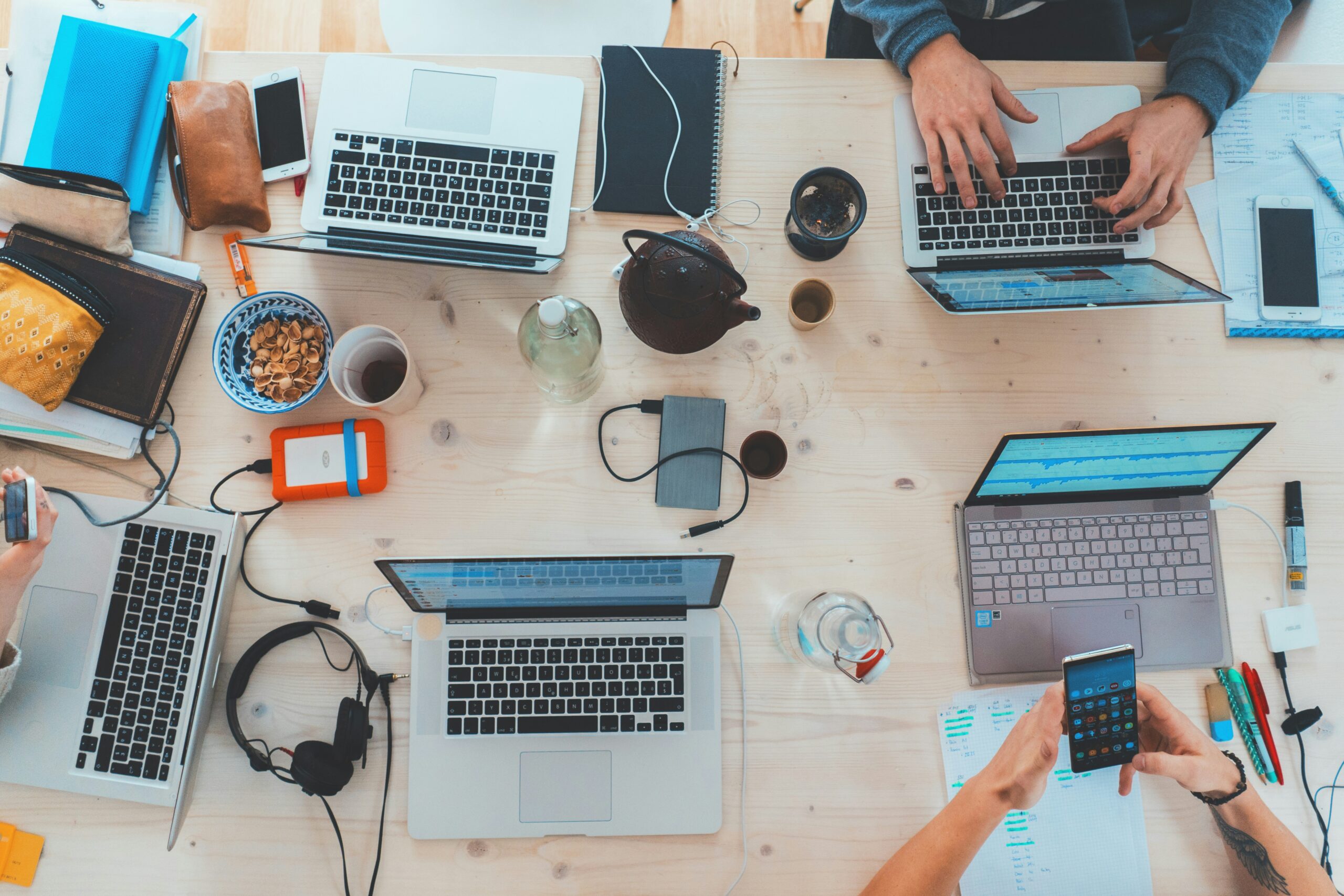Laptop and smartphone displaying a responsive website, showcasing 2025 digital marketing and web design trends with Creative60 expertise.